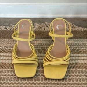 Yellow strappy heels